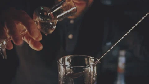 Bartender prepares a cocktail at the bar Stock Footage 167486012