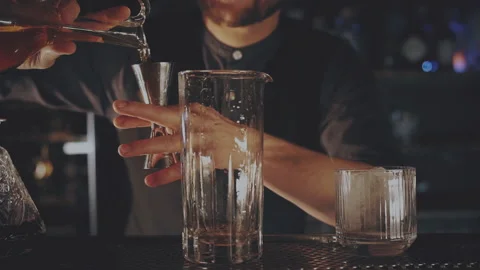 Bartender prepares a cocktail at the bar Stock Footage 167625841