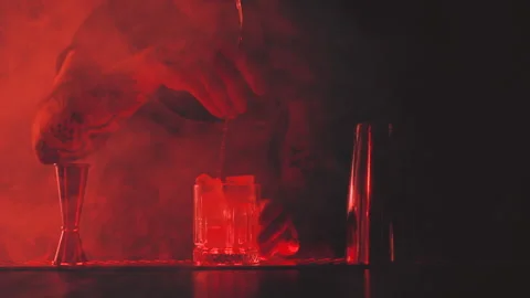 Bartender prepares a cocktail at the bar Stock Footage 168373328