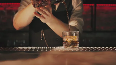 Bartender prepares a cocktail at the bar Stock Footage 219200703