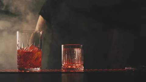 Bartender prepares a cocktail on a bar Stock Footage 219608887