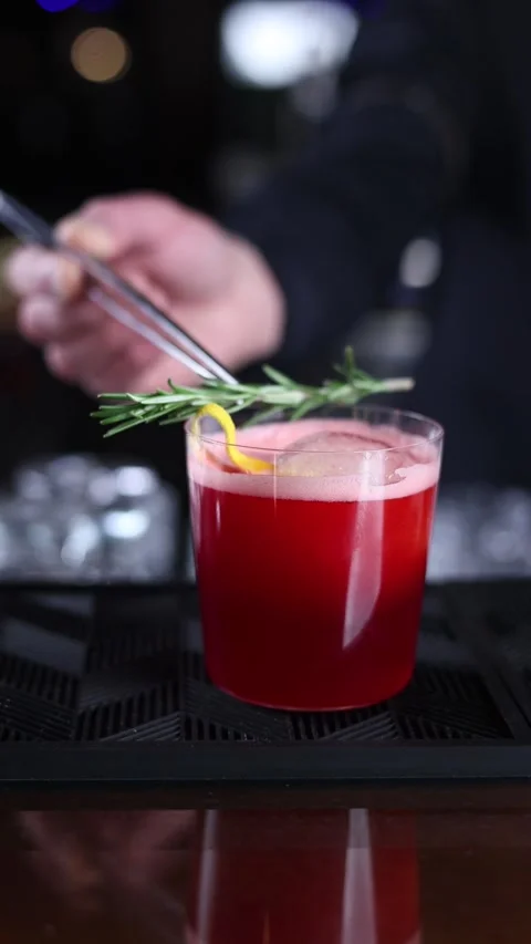 Bartender prepares a cocktail at the bar Stock Footage 265665563