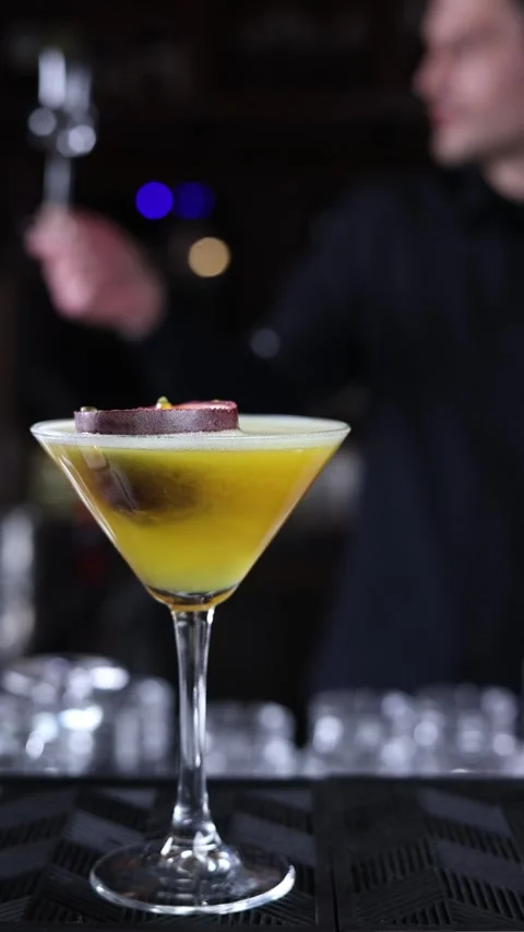 Bartender prepares a cocktail at the bar Stock Footage 265666033