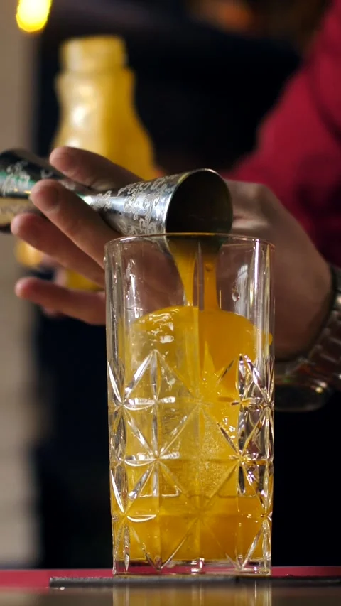 The bartender prepares a cocktail in the bar of the restaurant. Stock Footage 305448049