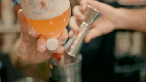 Bartender prepares a cocktail for a guest Video stock 223906864