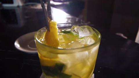 Bartender prepares a cocktail lemonade Stock Footage 150116859