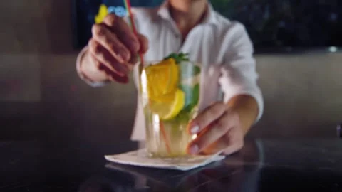 Bartender prepares a cocktail lemonade Stock Footage 150117485