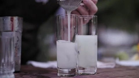 Bartender prepares a cocktail outside Stock Footage 220377592