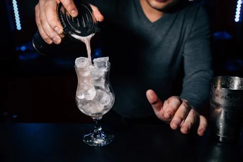 Bartender prepares a cocktail Stock Photos