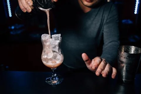 Bartender prepares a cocktail Stock Photos