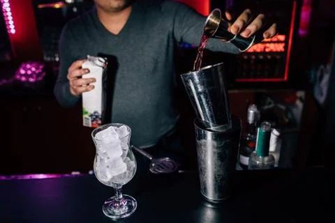 Bartender prepares a cocktail Stock Photos