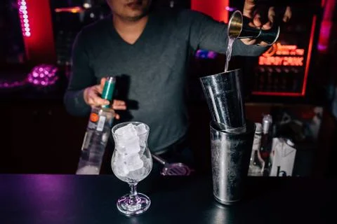 Bartender prepares a cocktail Stock Photos