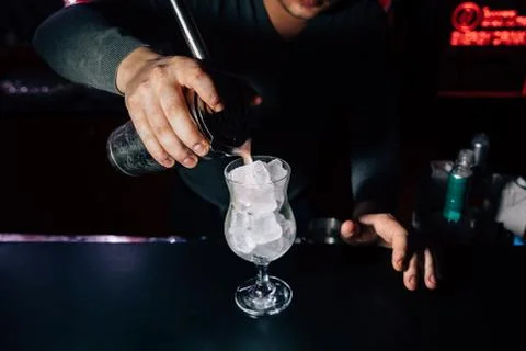 Bartender prepares a cocktail Stock Photos