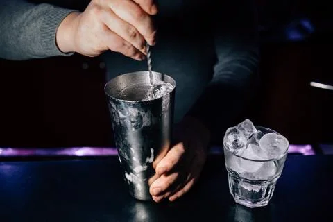 Bartender prepares a cocktail Stock Photos