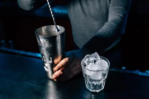 Bartender prepares a cocktail 스톡 사진