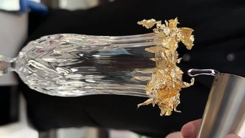 Bartender prepares a cocktail, pour pink Liqueur into a transparent glass. The Stock Footage 246474373