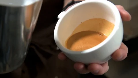 Bartender prepares coffee 120fps Stock Footage 97328154