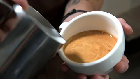 Bartender prepares coffee 120fps Stock Footage 97328277