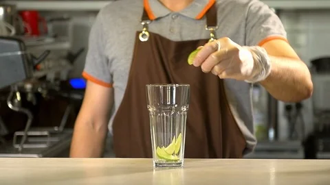Bartender prepares a cold drink 120 fps Stock Footage 97328389
