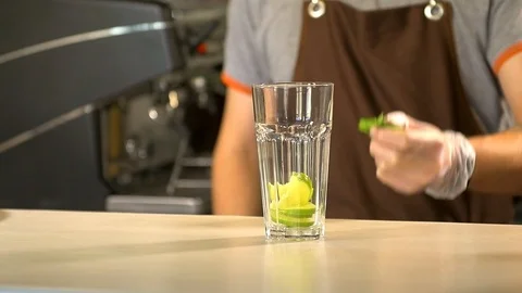 Bartender prepares a cold drink 120 fps Stock Footage 97328409