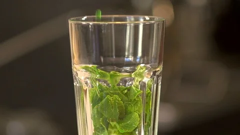 Bartender prepares a cold drink 120 fps Stock Footage 97328466