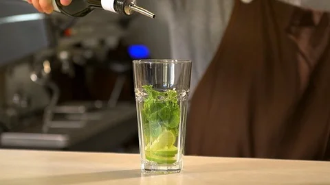 Bartender prepares a cold drink 120 fps Stock Footage 97328468