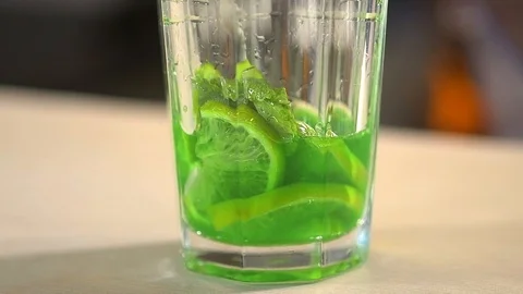 Bartender prepares a cold drink 120 fps Stock Footage 97328582