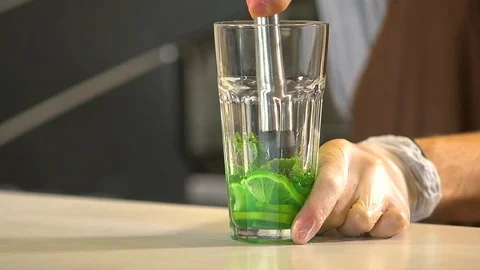 Bartender prepares a cold drink 120 fps Stock Footage 97328586