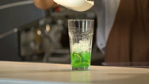 Bartender prepares a cold drink 120 fps Stock Footage 97328600