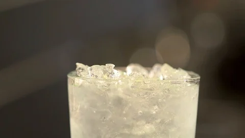 Bartender prepares a cold drink 120 fps Stock Footage 97328648