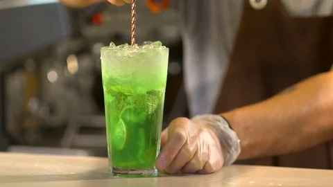 Bartender prepares a cold drink 120 fps Stock Footage 97328680