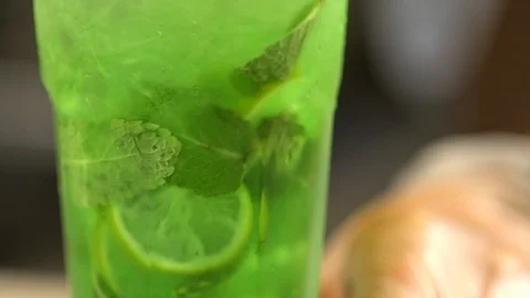 Bartender prepares a cold drink 120 fps Stock Footage 97328694
