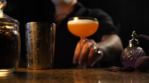The bartender prepares a delicious cocktail Stock Footage 137490340