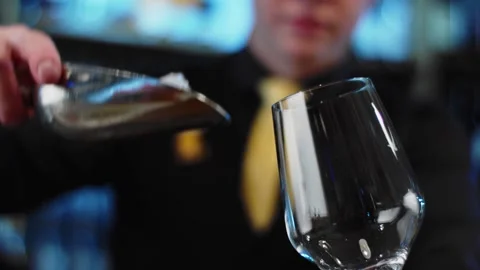 The bartender prepares a drink at the bar. Slow-mo. Close-up Stock Footage 131151891