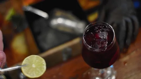 The bartender prepares a drink at the bar. Slow-mo. Close-up Stock Footage 131151898