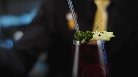 The bartender prepares a drink at the bar. Slow-mo. Close-up Stock Footage 131151910