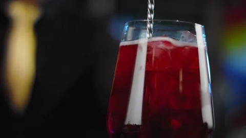 The bartender prepares a drink at the bar. Slow-mo. Close-up Stock Footage 131151922