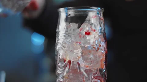 The bartender prepares a drink at the bar. Slow-mo. Close-up Stock Footage 131151977