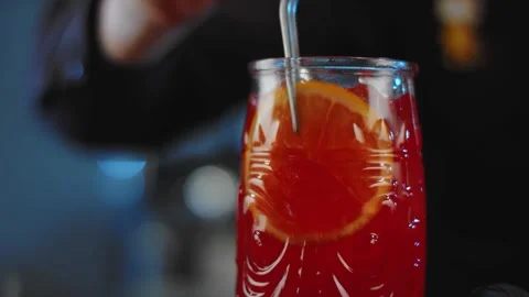 The bartender prepares a drink at the bar. Slow-mo. Close-up Stock Footage 131151991