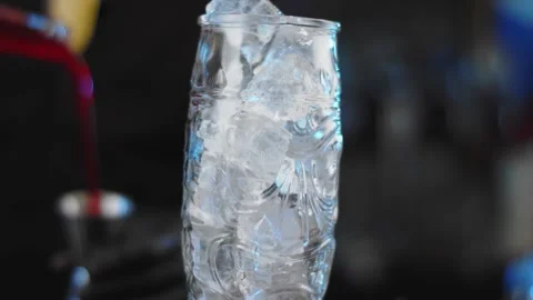 The bartender prepares a drink at the bar. Slow-mo. Close-up Stock Footage 131152005