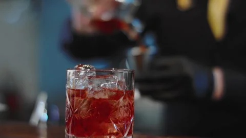 The bartender prepares a drink at the bar. Slow-mo. Close-up Stock Footage 131152016