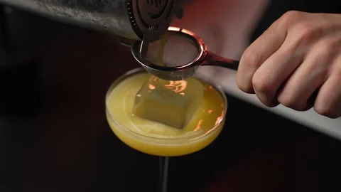 The bartender prepares an exotic cocktail Stock Footage 233164888