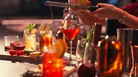 Bartender prepares modern cocktail in martini glass cinematic Vidéo 280508404