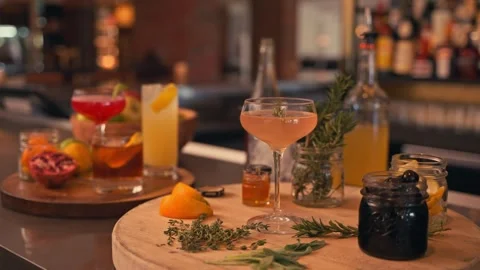 Bartender prepares modern cocktail in martini glass with garnish cinematic Vidéo 280514720