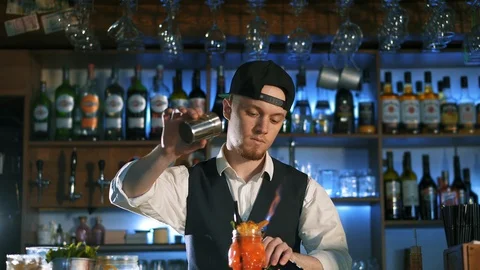 The bartender is preparing an alcoholic cocktail. Stock Footage 113749129