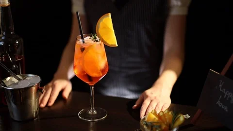 Bartender preparing Aperol spritz cocktail Stock Footage 126490949