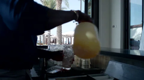 Bartender preparing cocktail drink for couple at bar area. Stock Footage 64111080