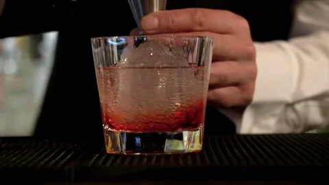A bartender preparing cocktails at the bar. Stock Footage 244941386