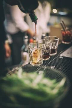 Bartender preparing cocktails Stock Photos