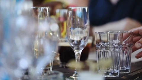 Bartender is preparing drinks, glasses at the bar Stock Footage 120578881